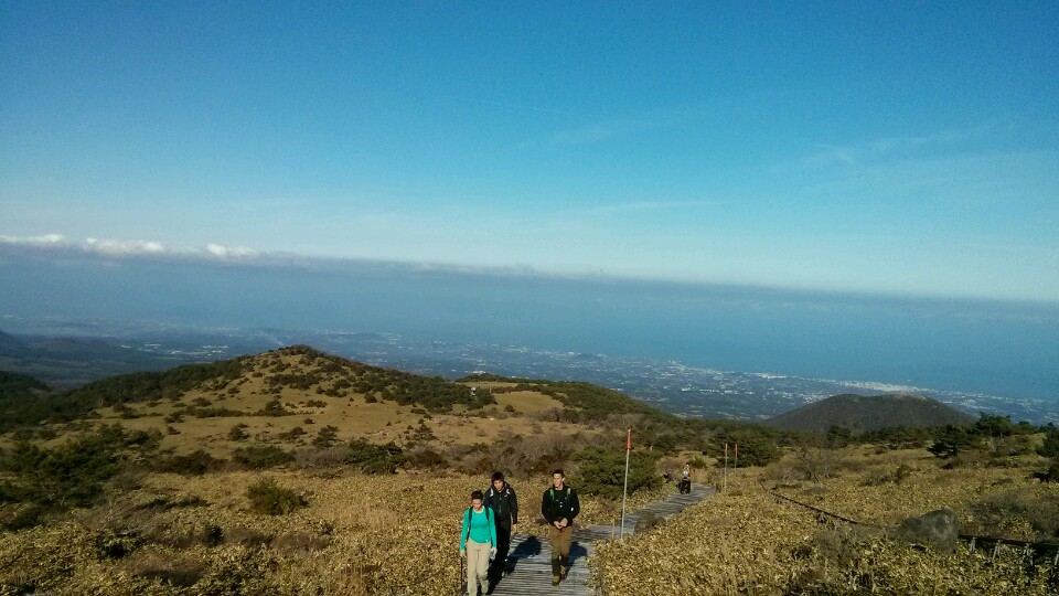 Hikers on Halla Mountain, Jeju Island, South Korea ] [Alt Text: photo of people hiking