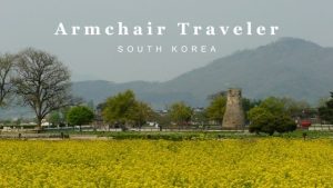 Armchair Traveler Series banner with Korean countryside landscape